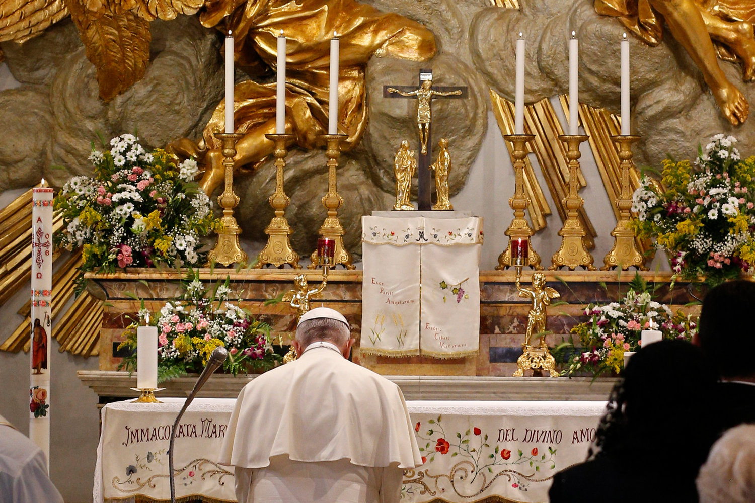 Pope Francis recites the rosary at the Shrine of Our Lady of Divine Love in Rome in this 2018 file photo. On March 11, 2020, in the midst of the COVID-19 pandemic, he entrusted the world to Mary.